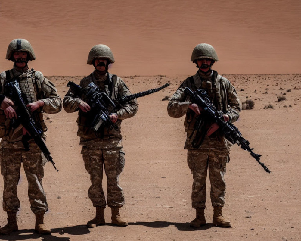 Military soldiers in desert camouflage with rifles and helmets