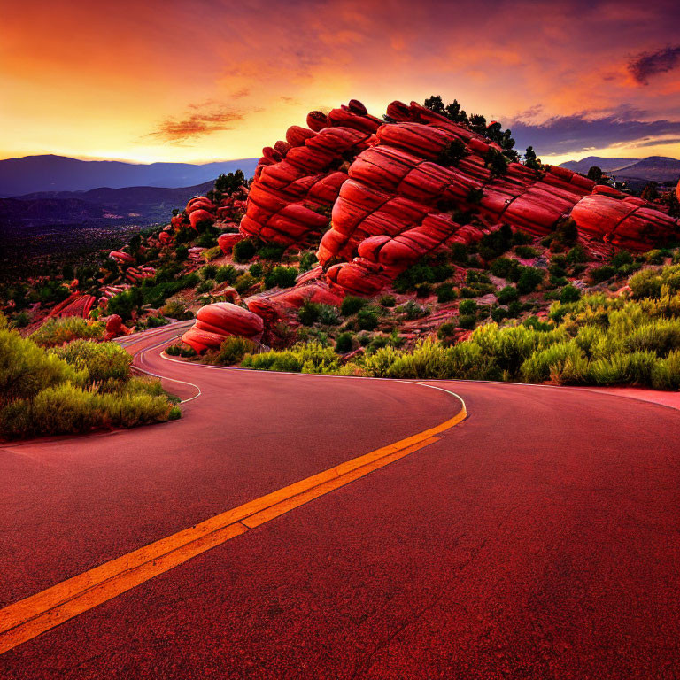 Scenic winding road through vibrant landscape with red rock formations