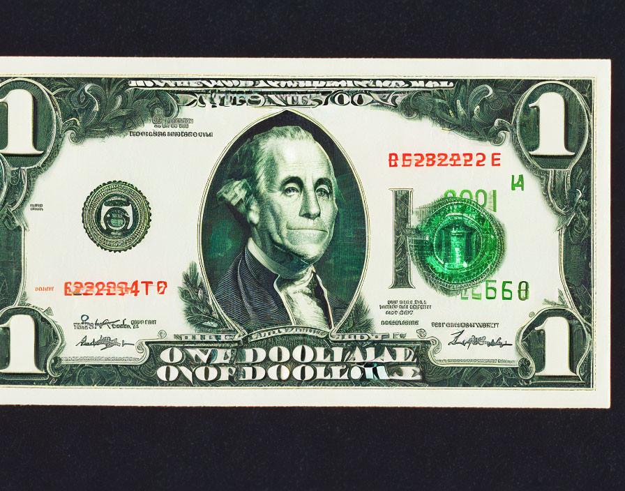 Detailed close-up of George Washington portrait on one-dollar bill