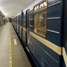 Modern subway station with two trains and sleek design