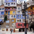 Whimsical buildings with flowering trees and ornate architecture