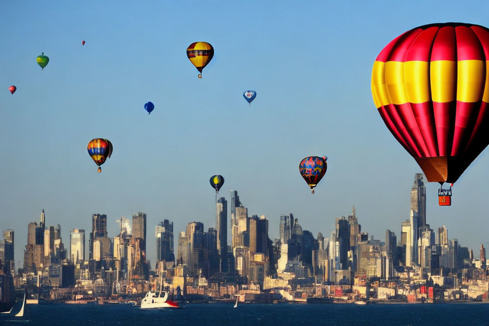 Vibrant hot air balloons over city skyline and blue skies