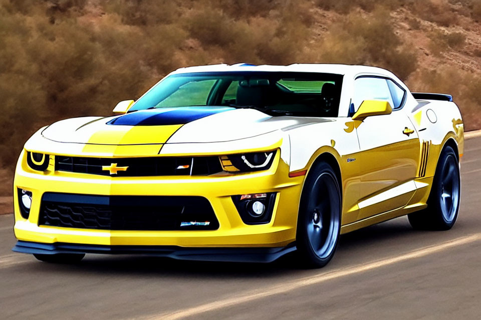 Yellow Chevrolet Camaro with Black Racing Stripes on Dirt Road