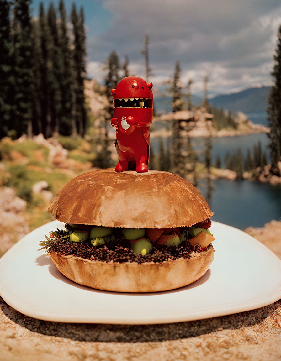 Toy Dinosaur on Veggie Sandwich Plate with Lake and Forest Background