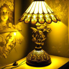 Art Nouveau Style Lamp with Intricate Designs and Warm Yellow Glow