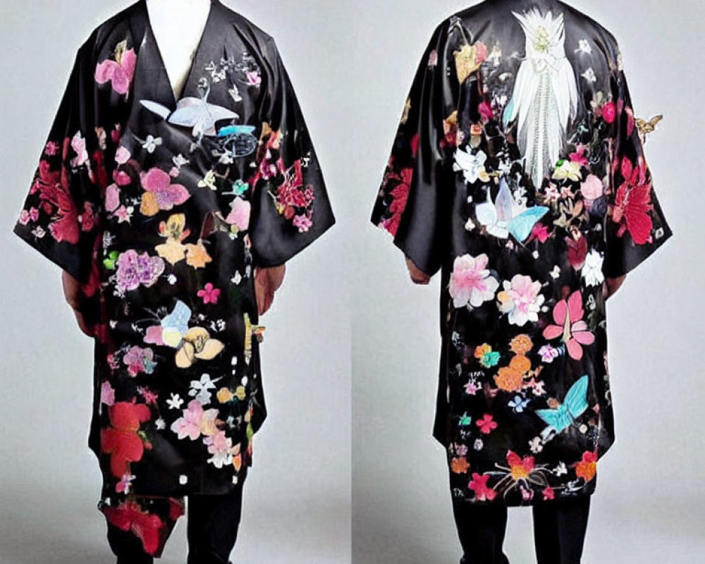 Traditional black kimono with colorful floral and bird patterns on person from front and back