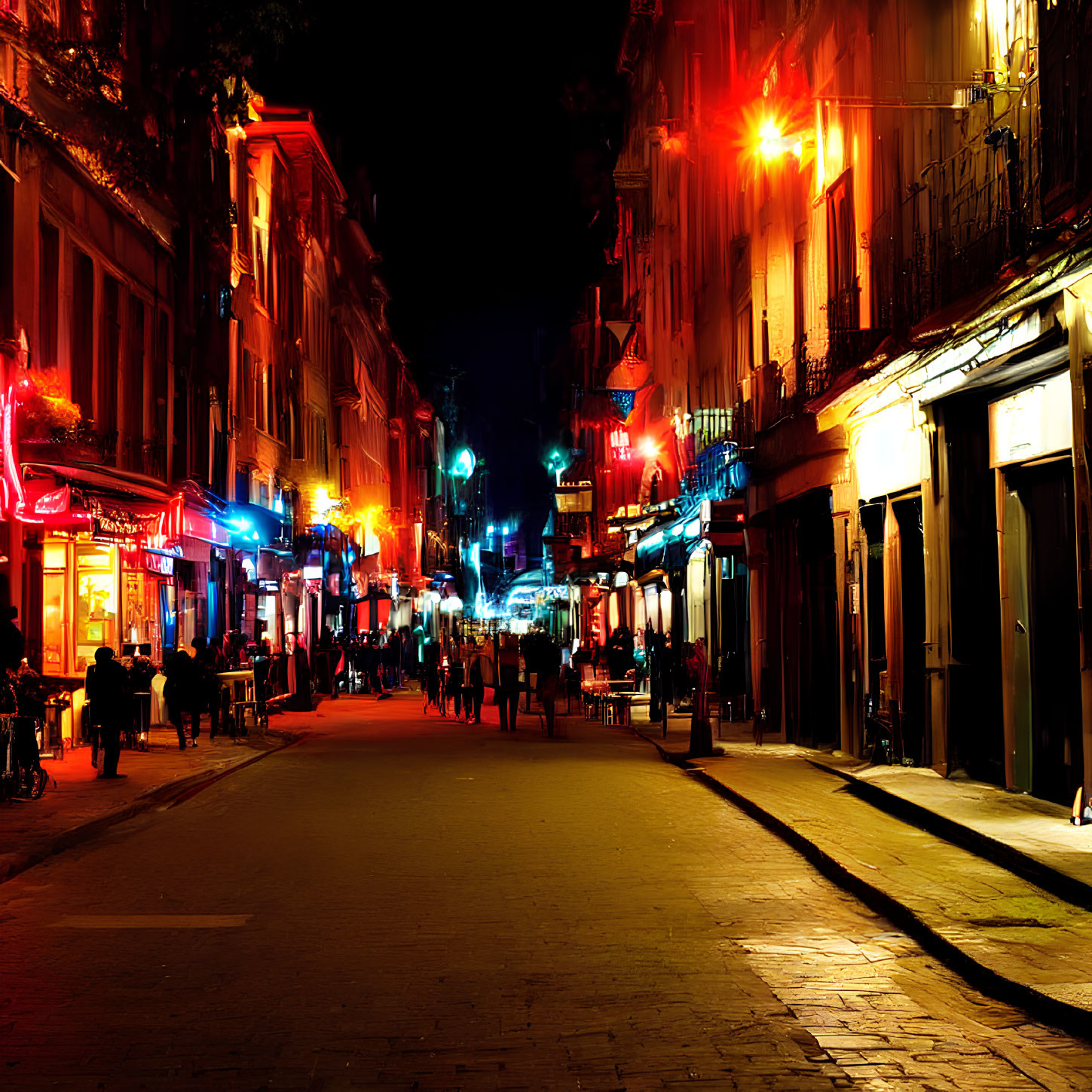 Vibrant Night Street Scene with Illuminated Signs and Pedestrians