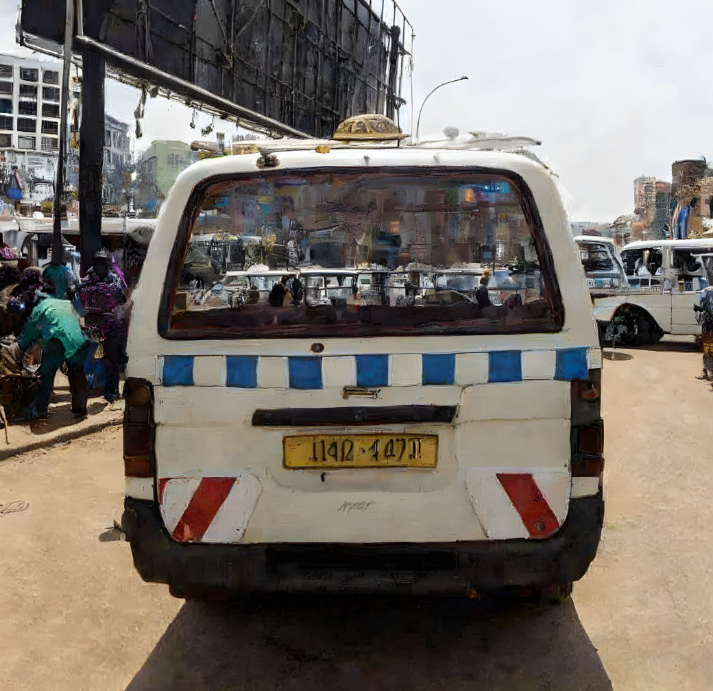 White Mini-Bus with Blue Stripes on Busy City Street