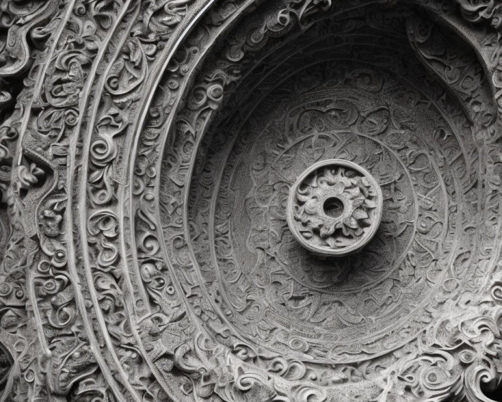 Detailed Stone Carving: Intricate Spiral and Floral Patterns