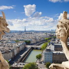 Ornate cityscape with golden sphinx and griffin statues