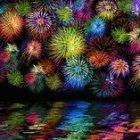 Colorful fireworks illuminate city skyline and water reflections