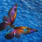 Colorful Digital Butterfly with Orange and Blue Wings on Sparkling Blue Water Background