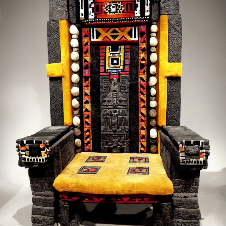 Intricate tribal-style throne with textiles, beads, and carvings