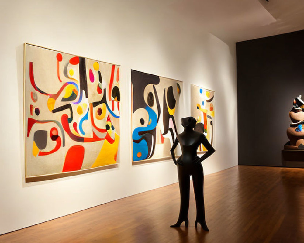 Abstract paintings adorn art gallery interior with observer silhouette