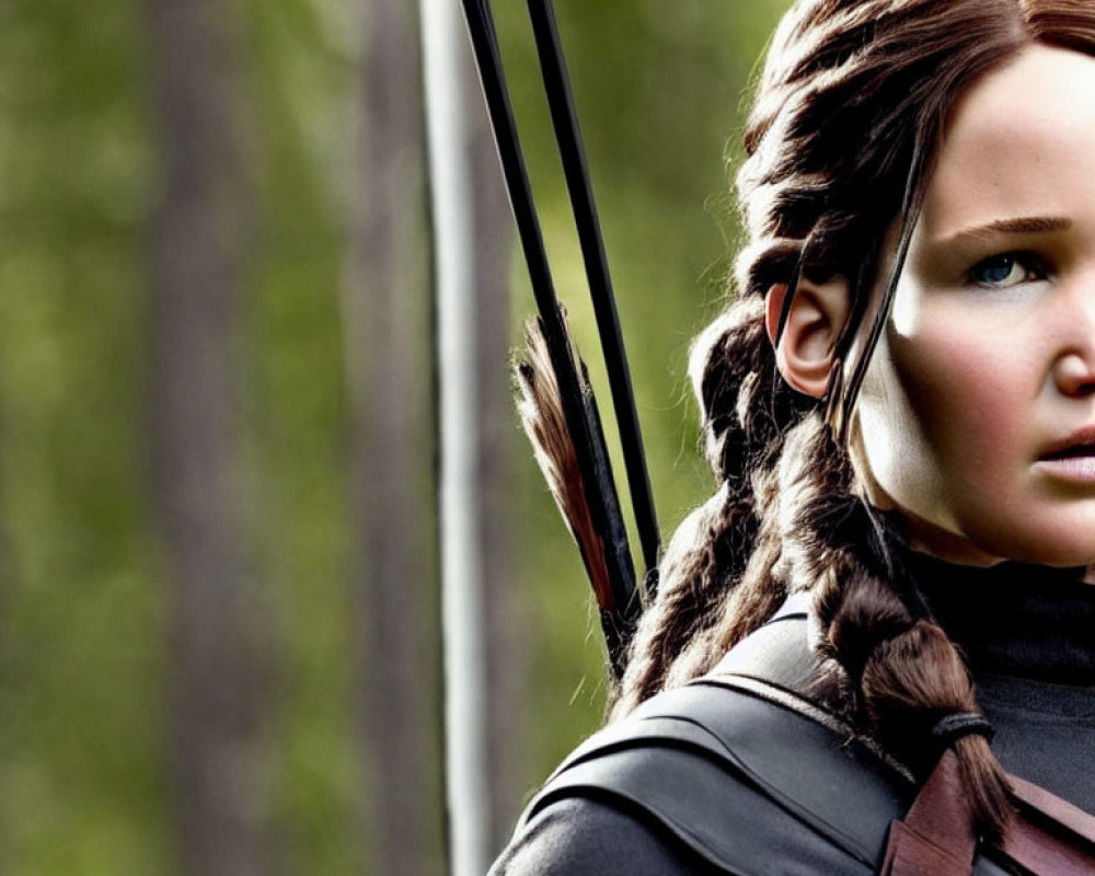 Focused woman with braided hair carrying bow and arrows in nature.