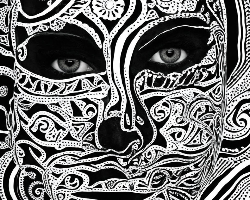 Detailed black and white intricate patterned face with swirling designs and realistic eyes.