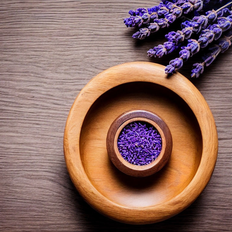 Lavender flowers and buds on wooden surface - Textured wood background