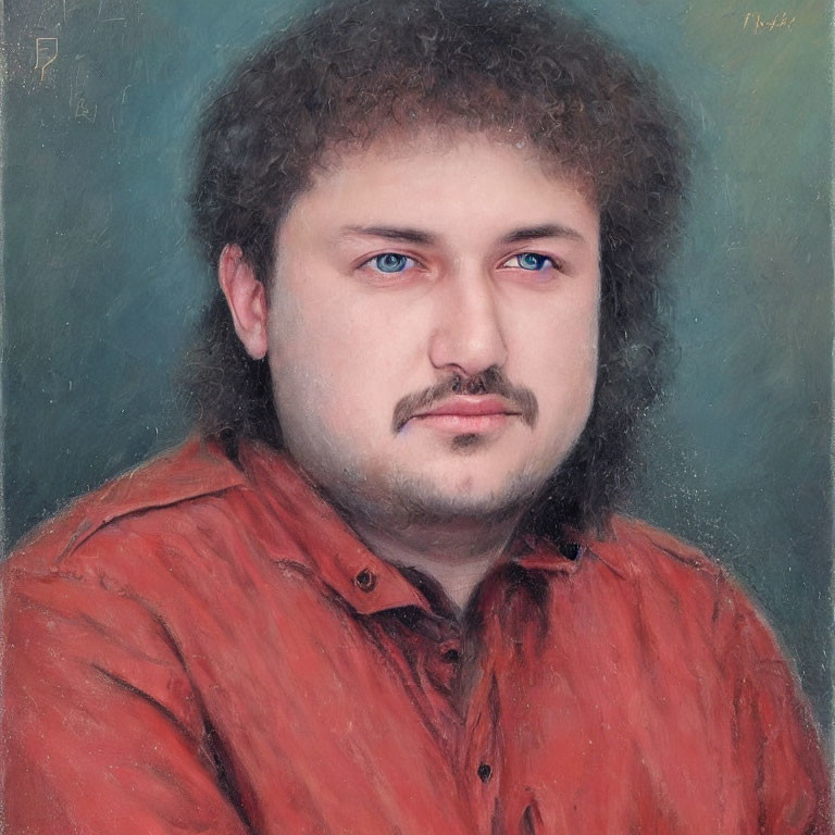 Man with Curly Hair, Mustache, and Beard in Red Shirt Portrait on Muted Background