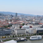 Futuristic cityscape with high-rise buildings and flying vehicles