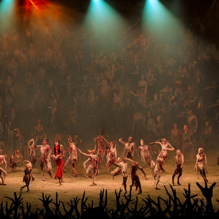 Crowded theatrical performance with woman in red under dramatic spotlight