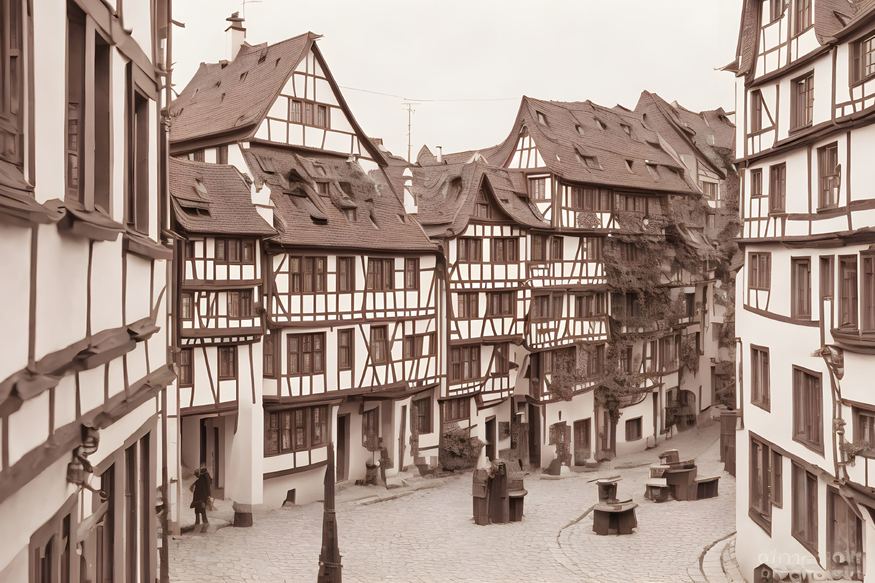 Traditional European alley with half-timbered houses, cobblestone street, and sepia tones