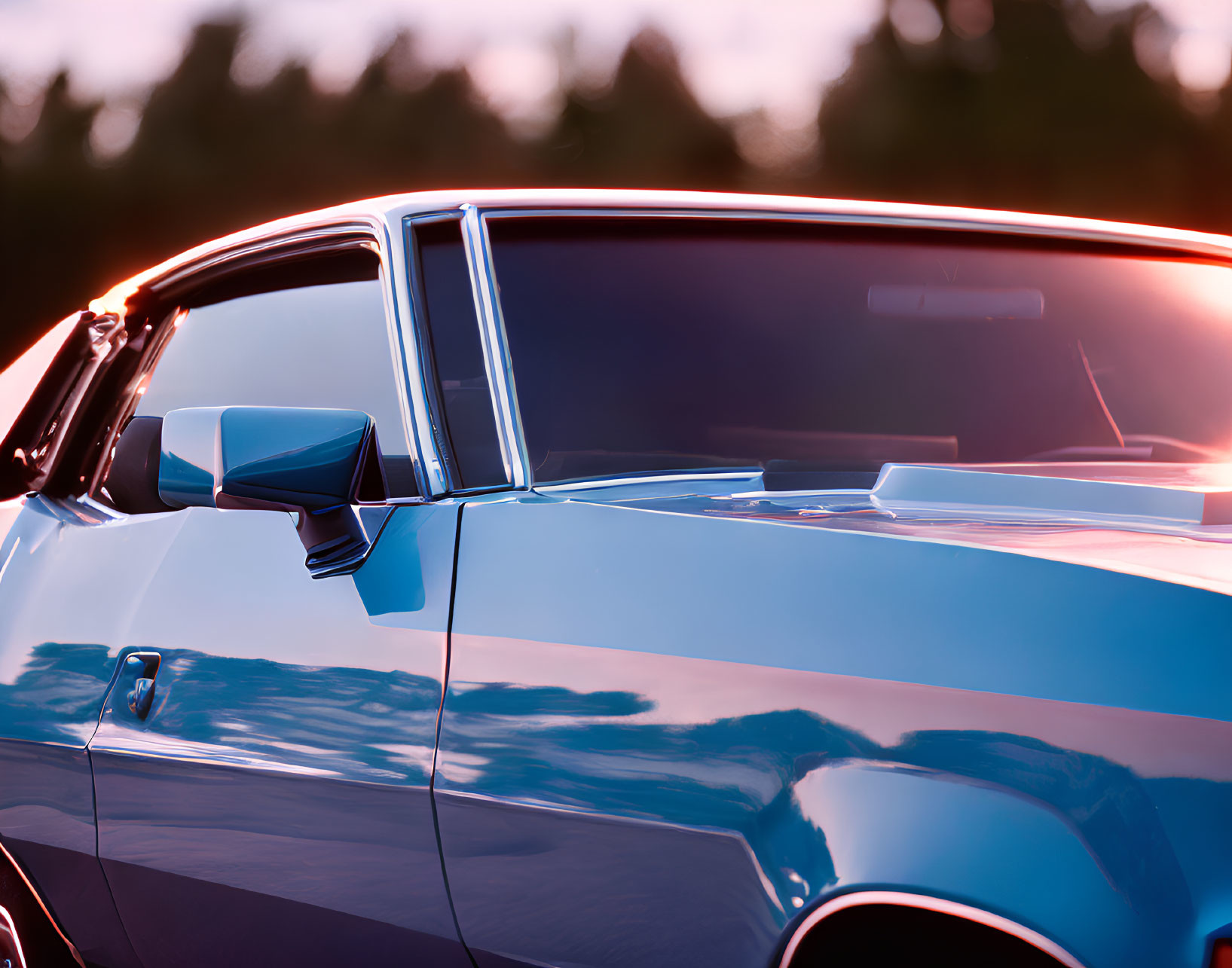 Classic Car Rearview Mirror Close-Up at Sunset with Sleek Lines in Vibrant Blue