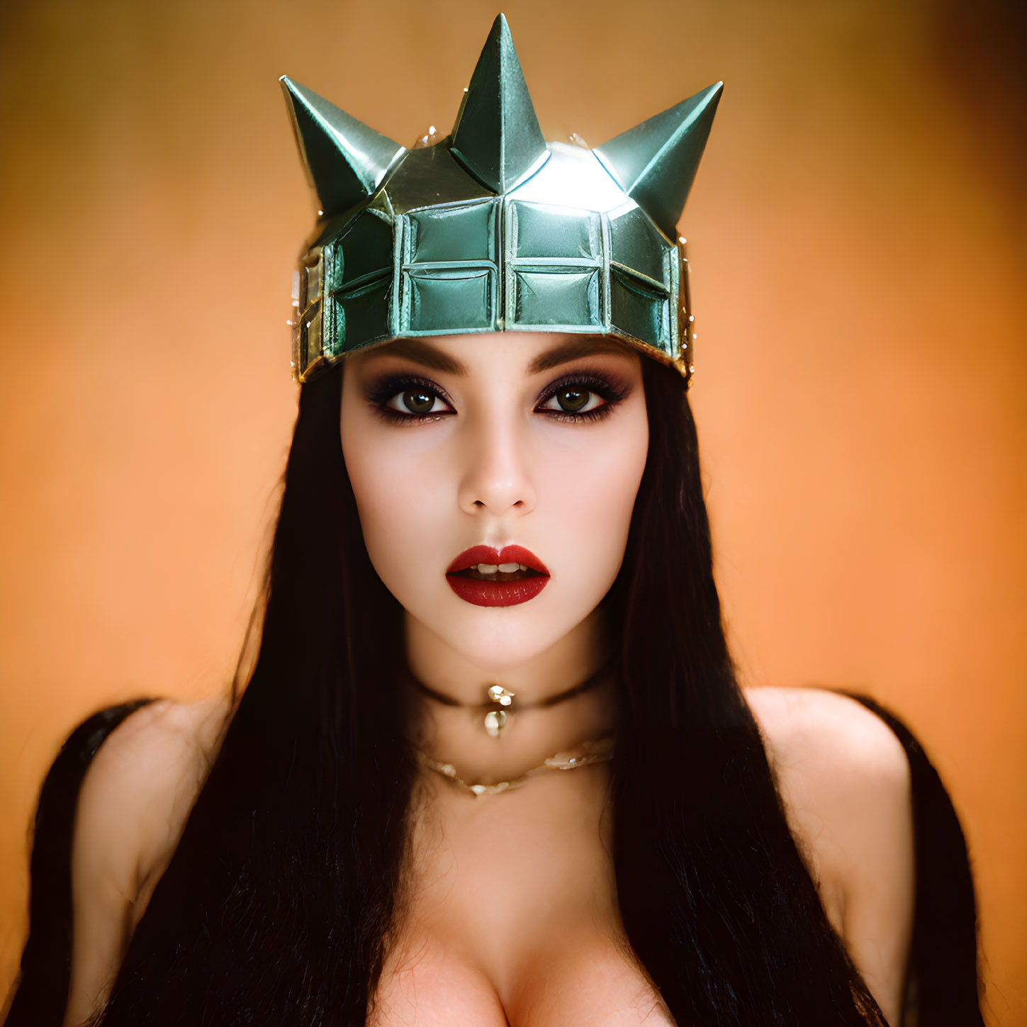 Dark-haired person in spiked crown with red lipstick and black outfit on golden backdrop