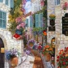 Quaint cobblestone street in European village with old houses and colorful flowers