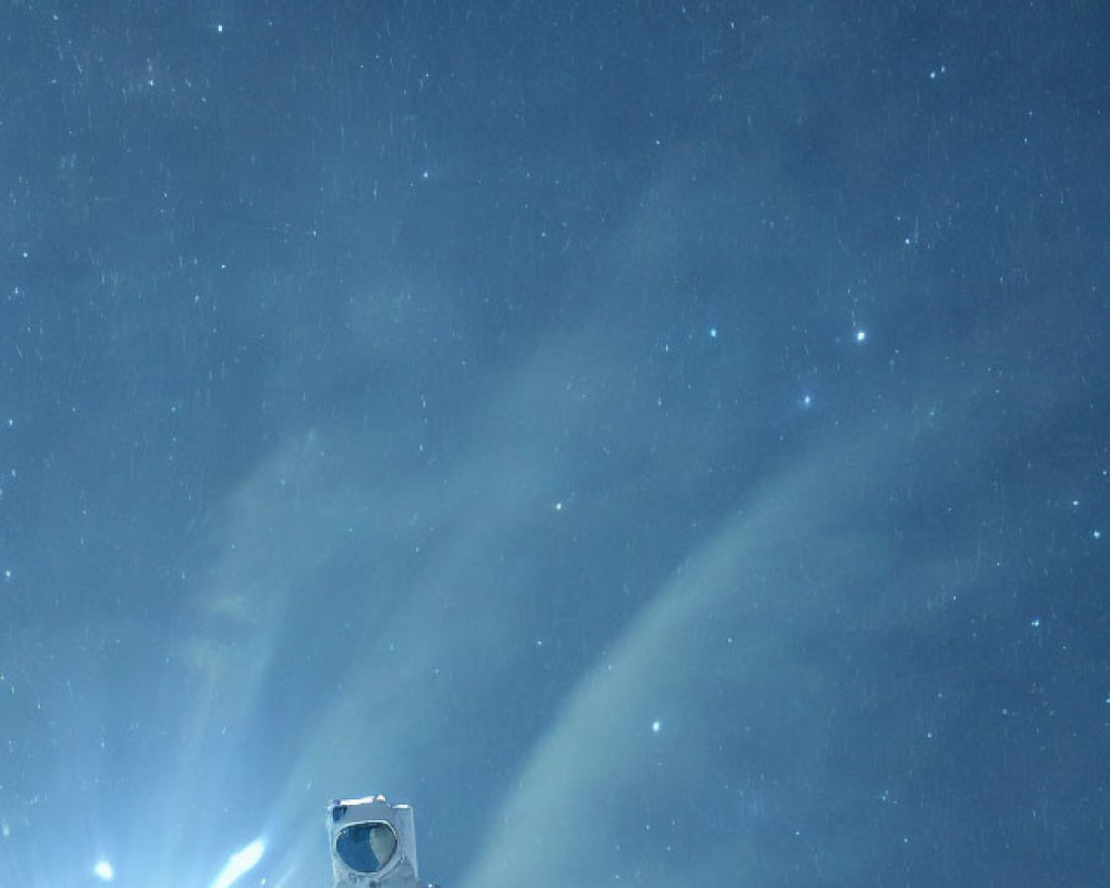 Astronaut under starry sky with bright light source