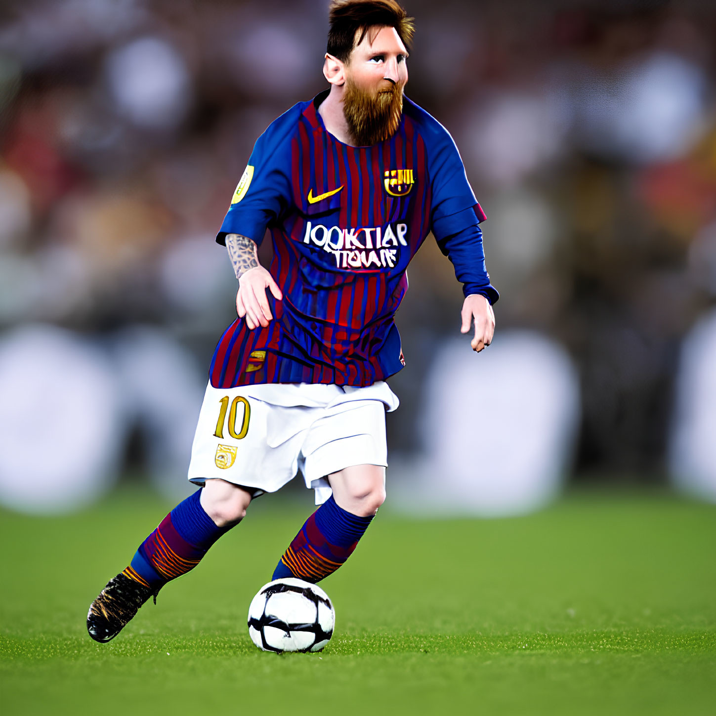 Soccer player in blue and red striped kit with number 10 dribbling ball