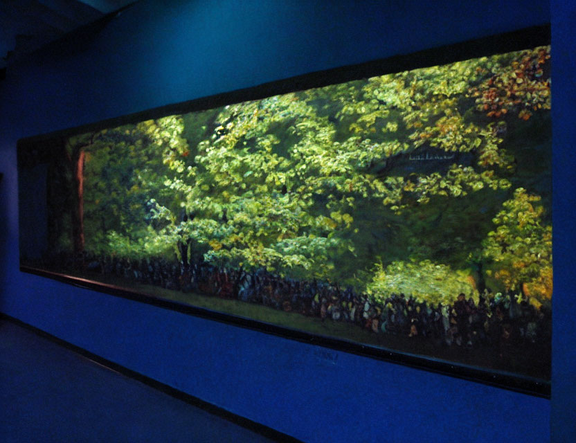 Panoramic backlit display of lush forest scene with crowd below