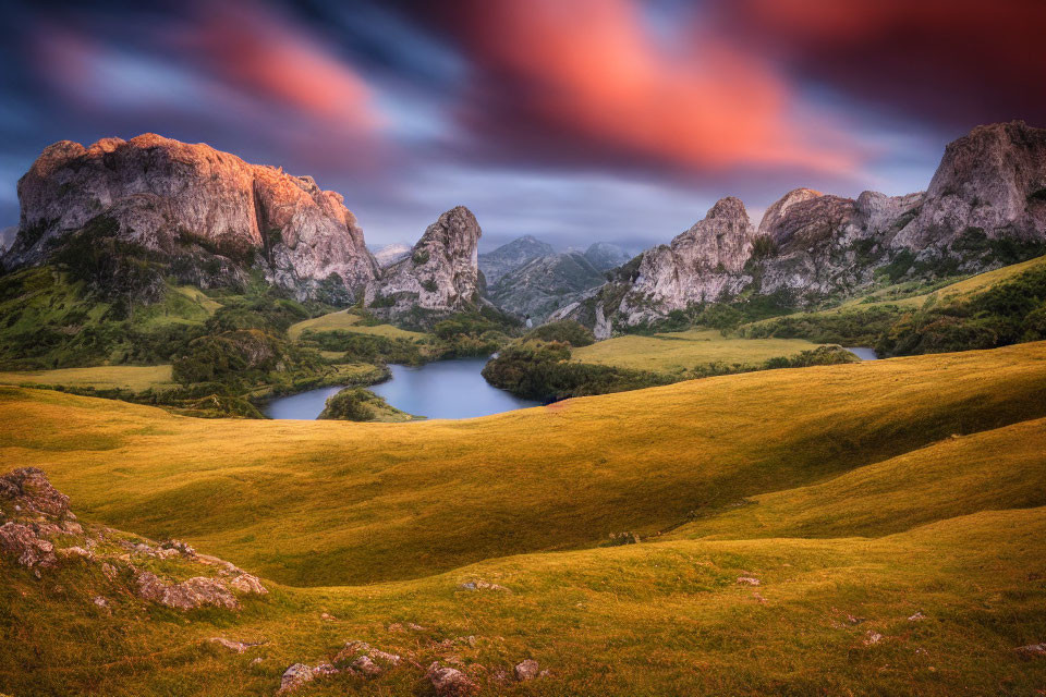 Tranquil landscape with green hills, serene lake, mountains, vibrant sunrise