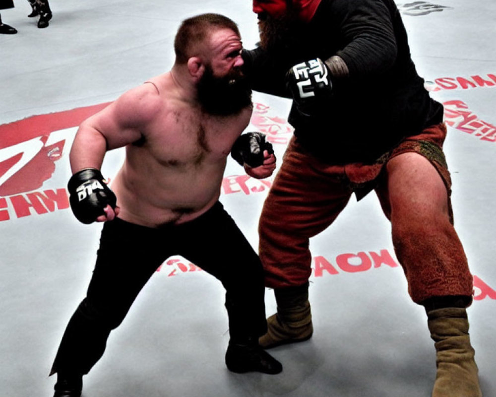 Two men wrestling in a ring with spectators and logos.