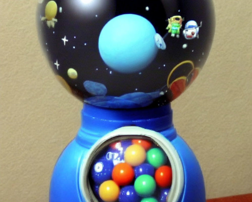 Space-themed gumball machine with celestial bodies and astronaut on blue base