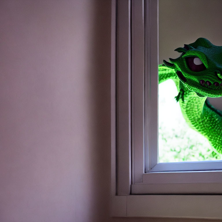 Green Dragon Puppet Peering Through White-Framed Window