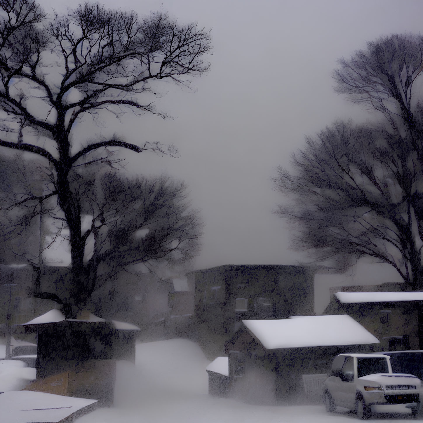 Snowy Winter Landscape with Silhouetted Trees, Houses, and Vehicle in Heavy Snowfall