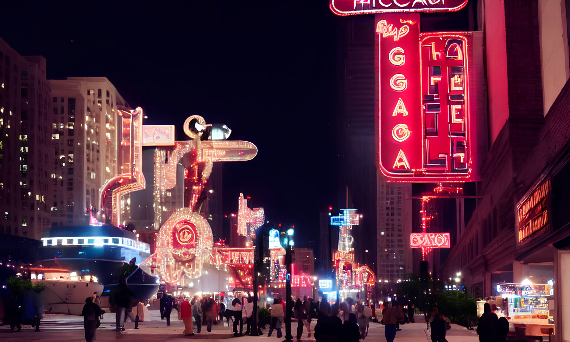 Vibrant neon signs illuminate bustling city street at night