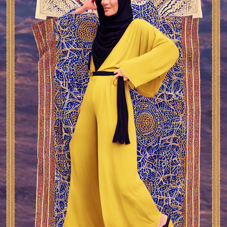 Vibrant yellow dress with black belt and hijab against blue and gold backdrop