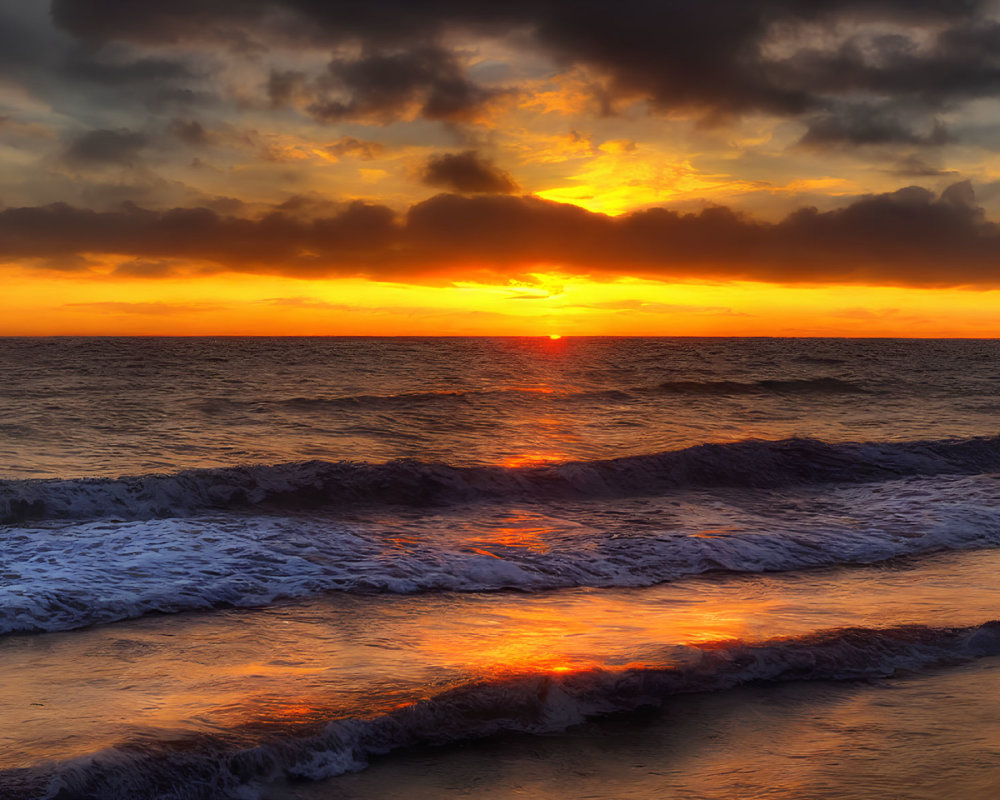 Fiery Orange and Yellow Sunset Reflection on Ocean Waves