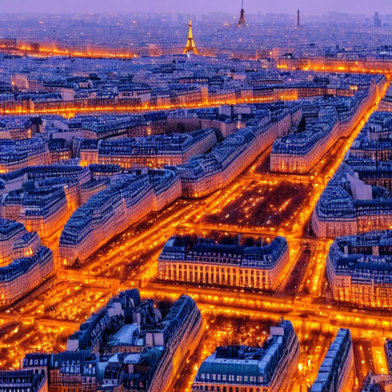 Aerial View of Paris at Dusk with City Lights and Eiffel Tower