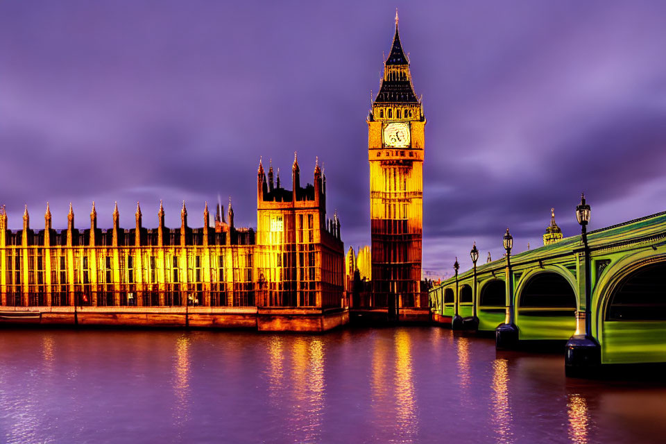 Iconic UK Parliament and Big Ben by Thames River at night with Westminster Bridge under purple sky