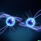 Glowing blue orbs with interweaving light trails on dark background