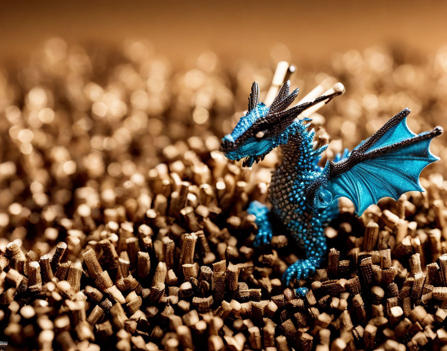 Blue Dragon Figurine on Brown Textured Terrain Display