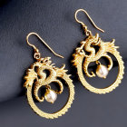 Intricate Gold Dragon Earrings with Dangling Crystal