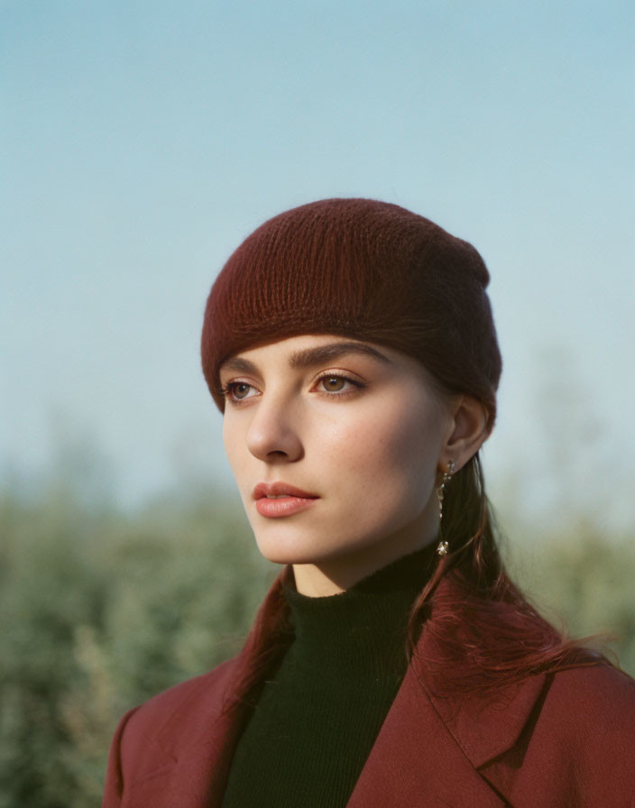 Burgundy Beanie and Coat Portrait in Natural Setting