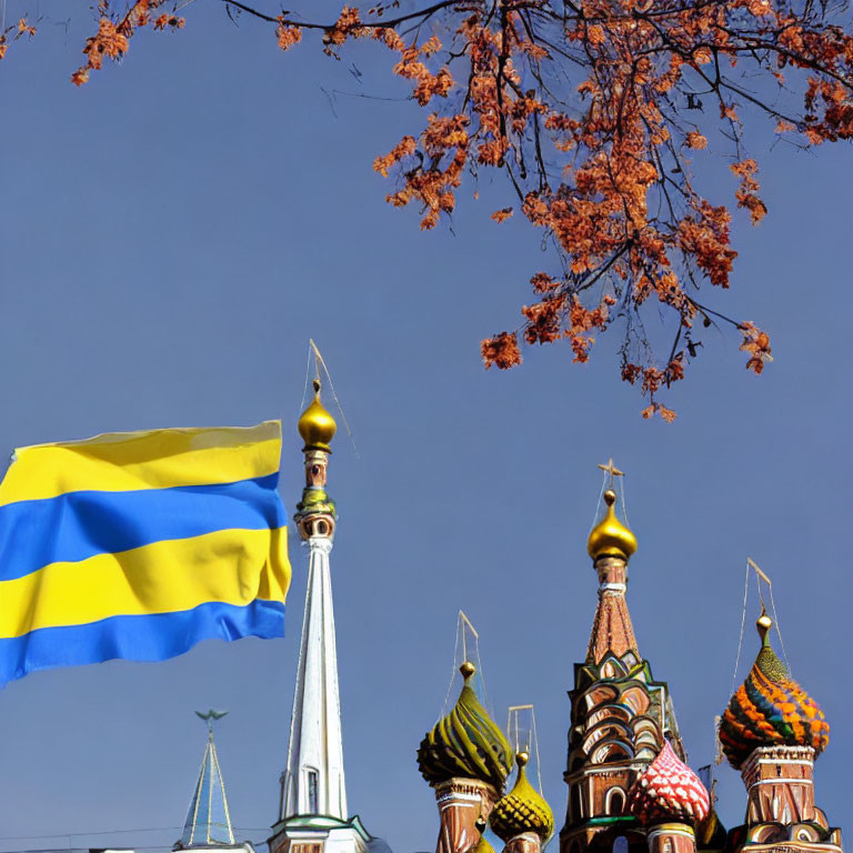 Ukrainian flag and Saint Basil's Cathedral under blue sky