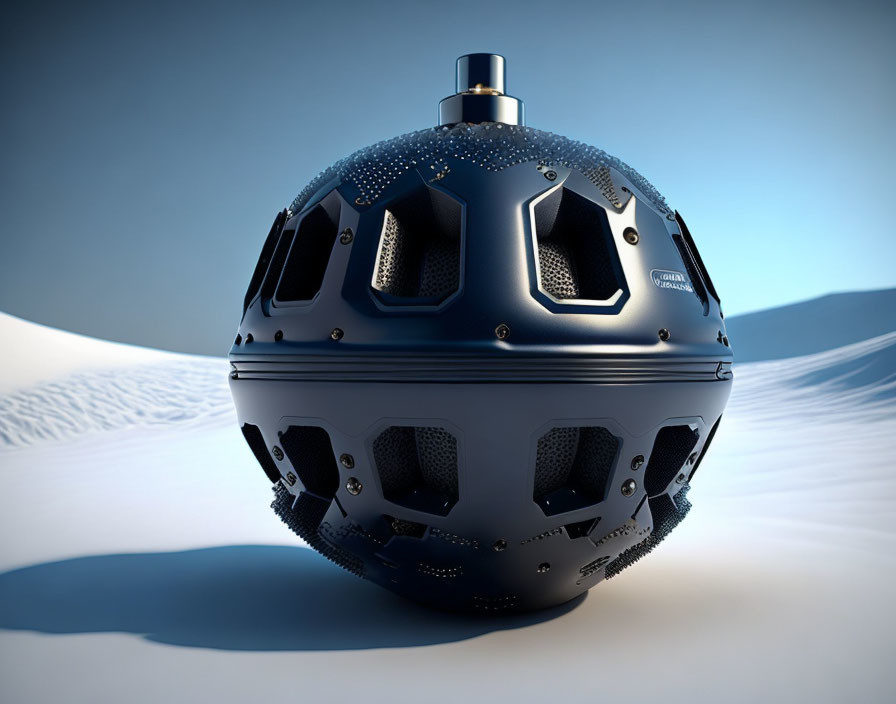 Patterned spherical device on sandy landscape under blue sky