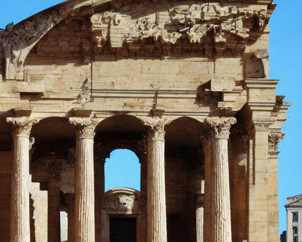 Roman structure with Corinthian columns and pediment sculptures