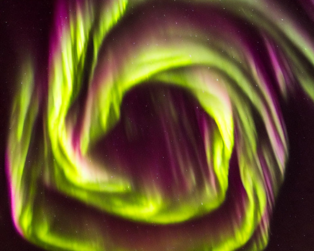 Vibrant Green and Purple Aurora Swirls in Night Sky