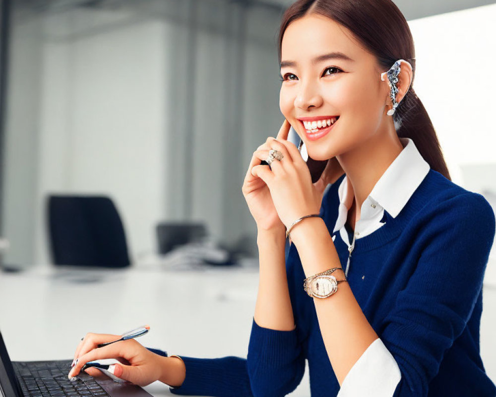 Smiling woman in blue sweater with earpiece and pen in office scene